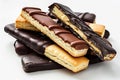 Shortbread Stick Biscuits Coated in Milk and Dark Chocolate. Bar Cookies, Long Biscuit Pile Isolated Royalty Free Stock Photo