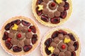 Shortbread tartlets decorated with whipped ganache and fruits