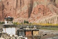 Shortens, yellow trees and red cliff in Dahkmar village, Mustang Royalty Free Stock Photo