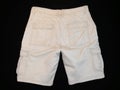 Shorts beige, back side, on black background