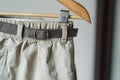 shorts with belt on hanger, closeup on waistband
