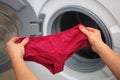 Shorts in hands for laundry Royalty Free Stock Photo