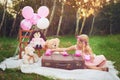 Tea time with my friends. Shot of an adorable little dressed as a princess having a teat party with her stuffed toys in