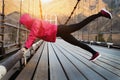 Shot of an adult athletics woman working out in the morning.