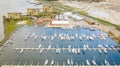 Winter harbour with plenty sailing boats shot from above