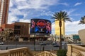 A shot along Las Vegas Blvd with cars driving on the street, The Treasure Island Hotel, GulleyÃ¢â¬â¢s, Trump hotel