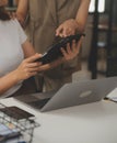 Shot of a asian young business Female working on laptop in her workstation