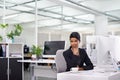 Shes never afraid of a challenge. Shot of an attractive young woman businesswoman in her office.