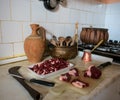 Shot of authentic kitchen with historical tools on background with liver meat