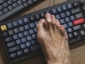 Mechanical gaming keyboard with modify tools with foot cracking Royalty Free Stock Photo