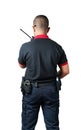 shot from the back Security guards talk radios There are rubber batons and handcuffs on the tactical belt. on a isolated white
