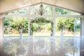 Shot of a beautiful decorated spacy white wedding hall