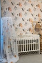 Shot of a bed in a modern baby room