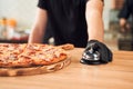 Shot of bell with pizza and backer Royalty Free Stock Photo
