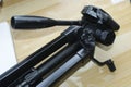 Tripod on angle Shot lay on a Decorated brown Table Royalty Free Stock Photo