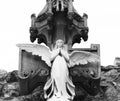 White angel praying on the pedestal Royalty Free Stock Photo