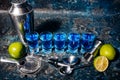 Shot of blue curacao alcoholic drinks, shot blue cocktails and lime Royalty Free Stock Photo