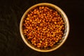 Shot of a bowl of coriander seeds.