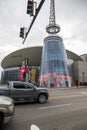 A shot of Bridgestone Arena with cars and trucks driving on the street on a cloudy day in Nashville Tennessee Royalty Free Stock Photo