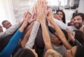 Way to go, team. Shot of a business team raising their hands while standing in a huddle. Royalty Free Stock Photo
