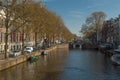 A shot of the canal in Amsterdam, Netherlands, from a bridge in the city