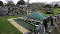 Shot of cemetery and tombstone for funeral burial from Covid 19 pandemic outbreak