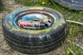Colorfully painted car tire it spraycan