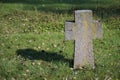 Shot of a concrete cross in nature