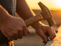 Shot of a construction worker calloused hands gripping a hammer Royalty Free Stock Photo
