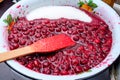 Shot of cooking and preparing homemade cherry jam in a pot. sugar inside the pot. Royalty Free Stock Photo