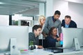 Success is the product of teamwork. Shot of corporate colleagues working together in their office.