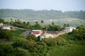 Shot of a couple of colorful private houses surrounded by trees