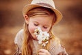 Shot of a cute red-haired girl having a rest outdoor Royalty Free Stock Photo