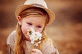 Shot of a cute red-haired girl having a rest outdoor Royalty Free Stock Photo