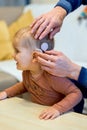 Shot of a deaf child with cochlear implants