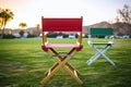 shot of directors chair with movie set in background