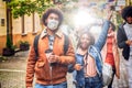 Shot of diverse group of friends having fun together outdoors Royalty Free Stock Photo