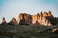 Shot of dry desert stones with some grass on a sunny day