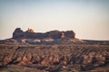 Shot of dry desert stones with some grass on a sunny day