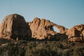 Shot of dry desert stones with some grass on a sunny day