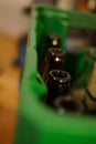 A shot of empy glass bottles ready to be recycled.