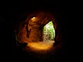 Shot of the exit of a dark cave