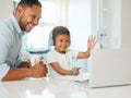 Hes ready to learn. Shot of a father and son doing homework together at home. Royalty Free Stock Photo