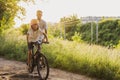 Father teaching his son how to ride a bicycle Royalty Free Stock Photo