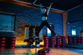 Shot of fit young woman using step platform at gym. Aerobic and fitness exercises. Royalty Free Stock Photo