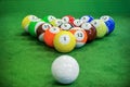 Shot of foot pool balls standing on green table. Royalty Free Stock Photo