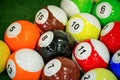 Shot of foot pool balls standing on green table. Royalty Free Stock Photo