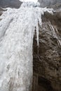 shot of frozen water made from bottom of winter waterfall