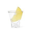 Shot glass of vodka with lemon isolated on white Royalty Free Stock Photo