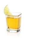 Shot of gold tequila with lime slice Royalty Free Stock Photo